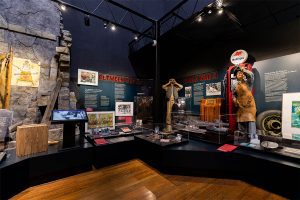 Museum displays of WWII vessels, photos and artifacts from the era.
