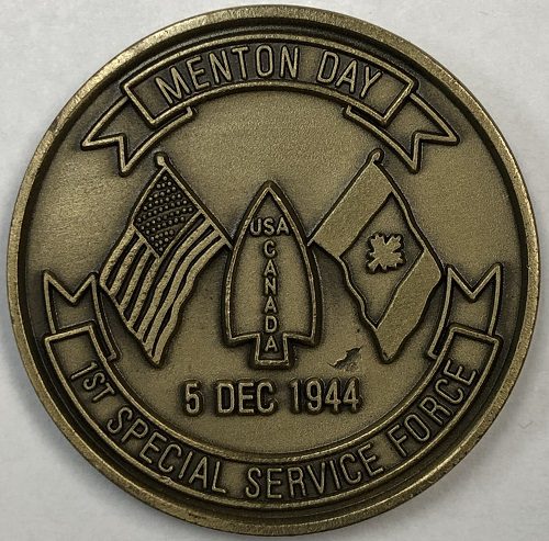 Photo of a Menton Day challenge coin.