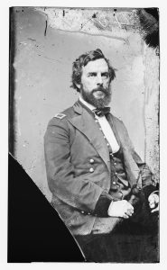 portrait of a bearded man in a military uniform seated