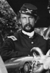 Bearded man in a military uniform with a cocked hat.