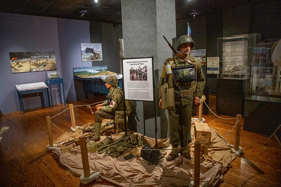 Gallery shot showing a sitting mannequin medic and a standing soldier.