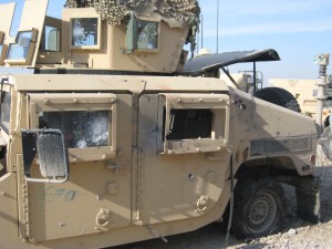 After the IED: Humvee after being struck by an explosively formed penetrator (EFP).