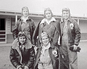 Fellow WASPs posing together in their flight gear.
